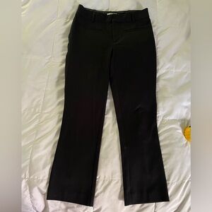 Maeve Anthropologie black pants low rise boots cut. Size 6